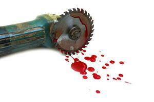 Circular saw disc bloody on white background photo