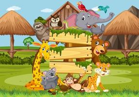 Empty wooden board with various wild animals in the forest vector