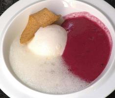 Ice cream with raspherries and emulsified lemon photo