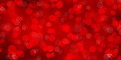 Light Red vector background with circles.