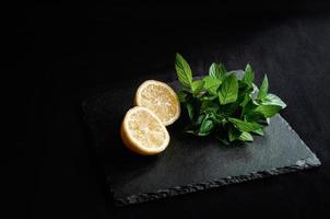 Ingredients for mojito summer citrus cocktail with lemon and mint photo