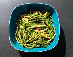 Fresh green beans with tomato and parsley photo