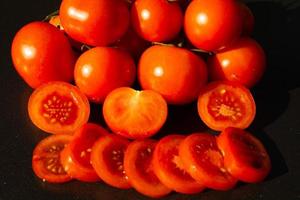 red round Tomatoes Solanum Lycopersicum photo