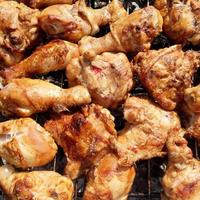 grilled chicken meat on the grill ready for eating barbeque