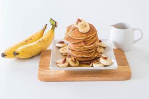 Almond banana pancake with chocolate syrup photo