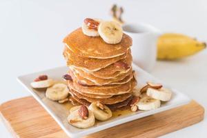 Almond banana pancake with honey photo