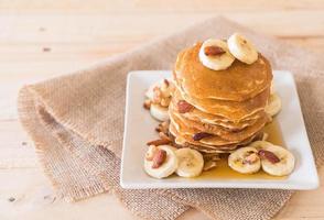 Almond banana pancake with honey photo