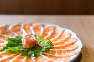 Sliced salmon sashimi - Japanese food photo