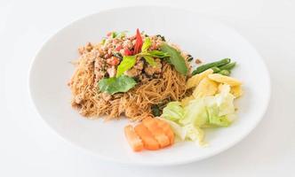 Stir-fried noodle with pork and basil photo