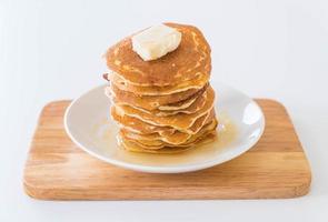 Cheese on pancake stack with honey photo