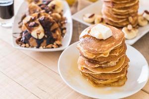 Mixed pancake menu - almond banana pancake with chocolate syrup, almond banana pancake with honey, and cheese pancake photo