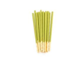 Biscuit stick with green tea flavored on white background photo