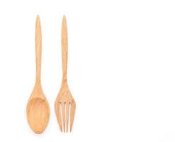 Wood spoon and fork on white background photo