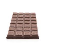 Chocolate bars on white background photo