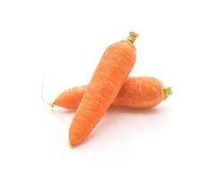 Baby carrots on white background photo