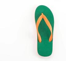 Rubber slippers on white background photo