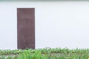 Door with empty wall background photo