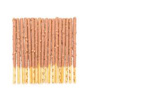 Biscuit stick with almond-flavored on white background photo