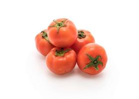Fresh tomatoes on white background photo