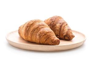 Butter croissant on white background photo