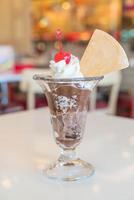 Chocolate sundae ice cream in cafe photo