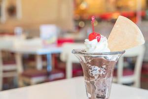 Chocolate sundae ice cream in cafe photo