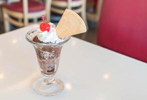 Chocolate sundae ice cream in cafe photo