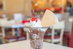 Chocolate sundae ice cream in cafe photo