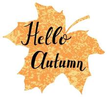 Hello autumn vector lettering on leaf-shaped background