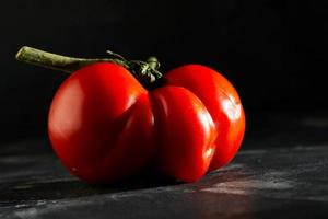 Ugly fruit or vegetable. Severely malformed mutant tomato photo