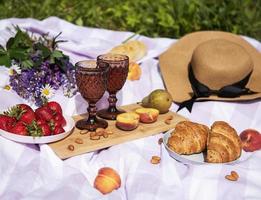 Romantic picnic scene on summer day photo