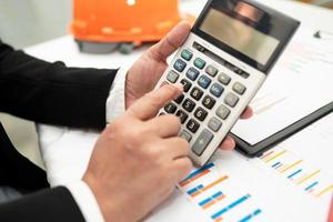 Architect or engineer working project accounting photo