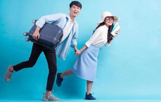 Asian couple are traveling together photo