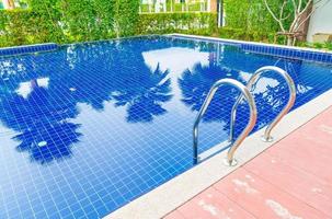 Stair swimming pool in beautiful luxury hotel pool resort photo