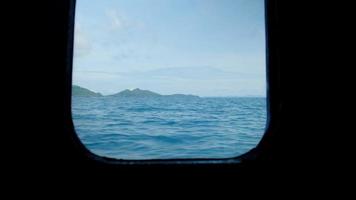 View looked through the window in ferry ship's passenger cabin. video