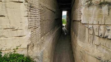 road through the rock Inkermanovsky limestone quarry, Crimea photo