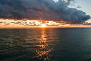 Aerial view of the sea landscape with a beautiful sunset photo