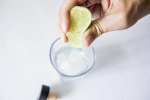 hand squeezing a lemon photo