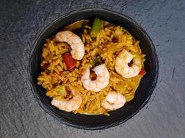 shrimps and spicy vegetables with curry rice photo