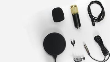 Top view of Microphone on white background photo