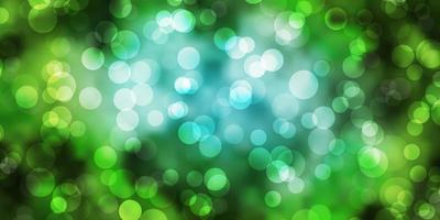 Light Blue, Green vector backdrop with dots.