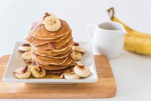 Almond banana pancake with honey photo