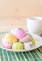 Colorful dessert mochi on white plate photo