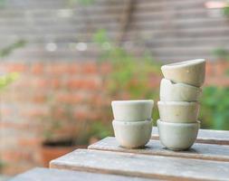 Small porcelain cup on the table photo