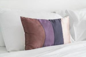 Pillow on bed decoration in bedroom interior photo