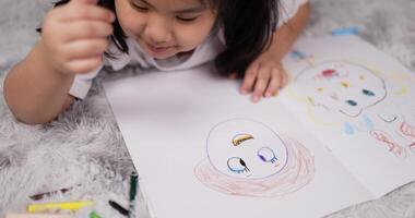 Girl Enjoying using Colors on Drawing Paper video