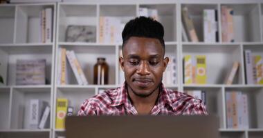 Young Man Working on Laptop at Home video