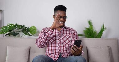 Handsome Man Chatting with Friend in App on Smartphone video