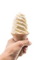 Vanilla ice cream cone on white background photo