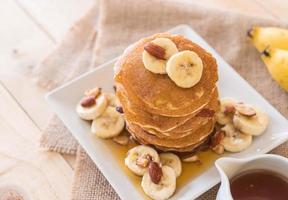 Almond banana pancake with honey photo